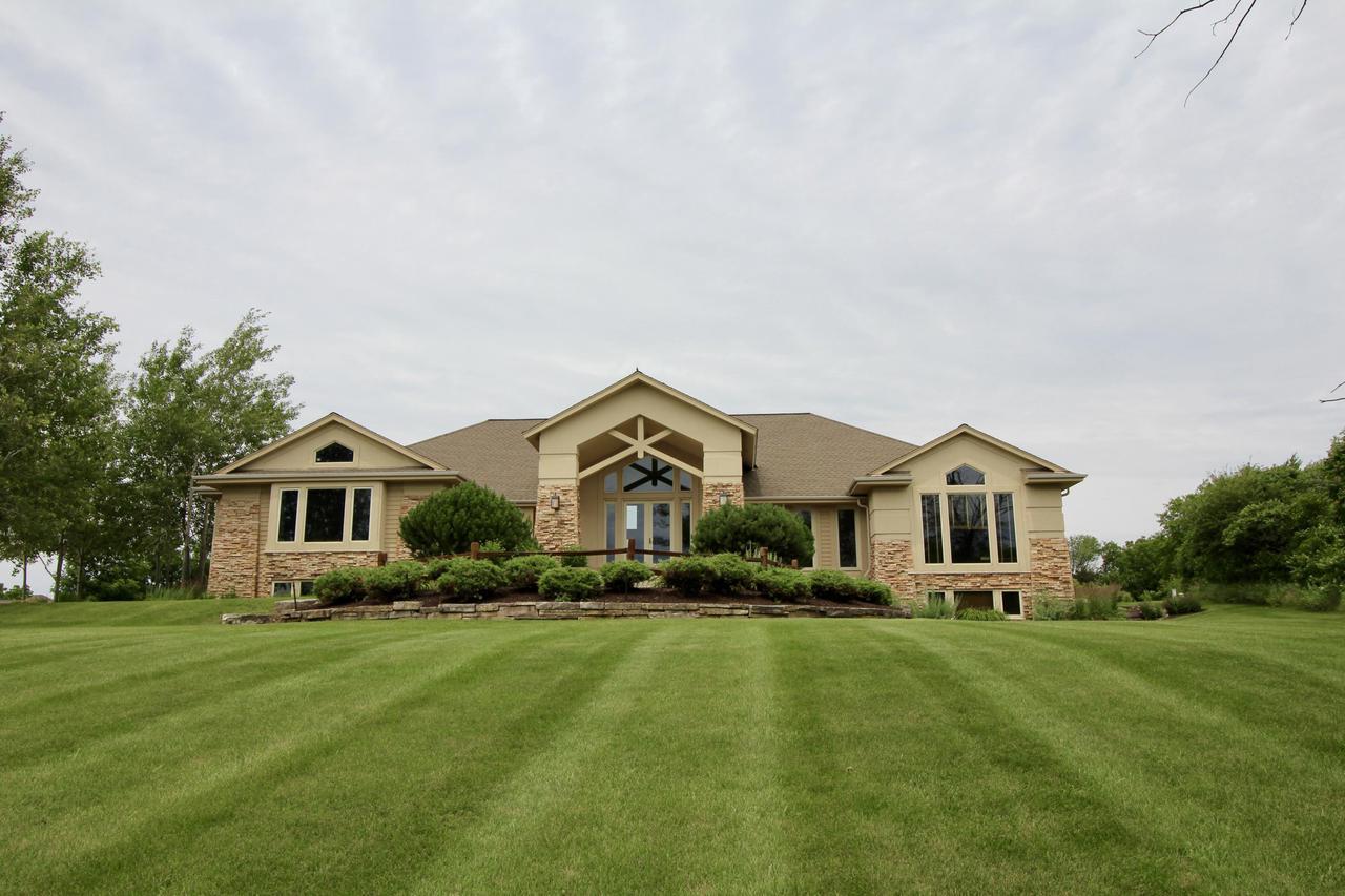 New berlin wi homes over 1000000 for sale set back high on 2 ac is this prairie styled contemporary ranch home landscaped with