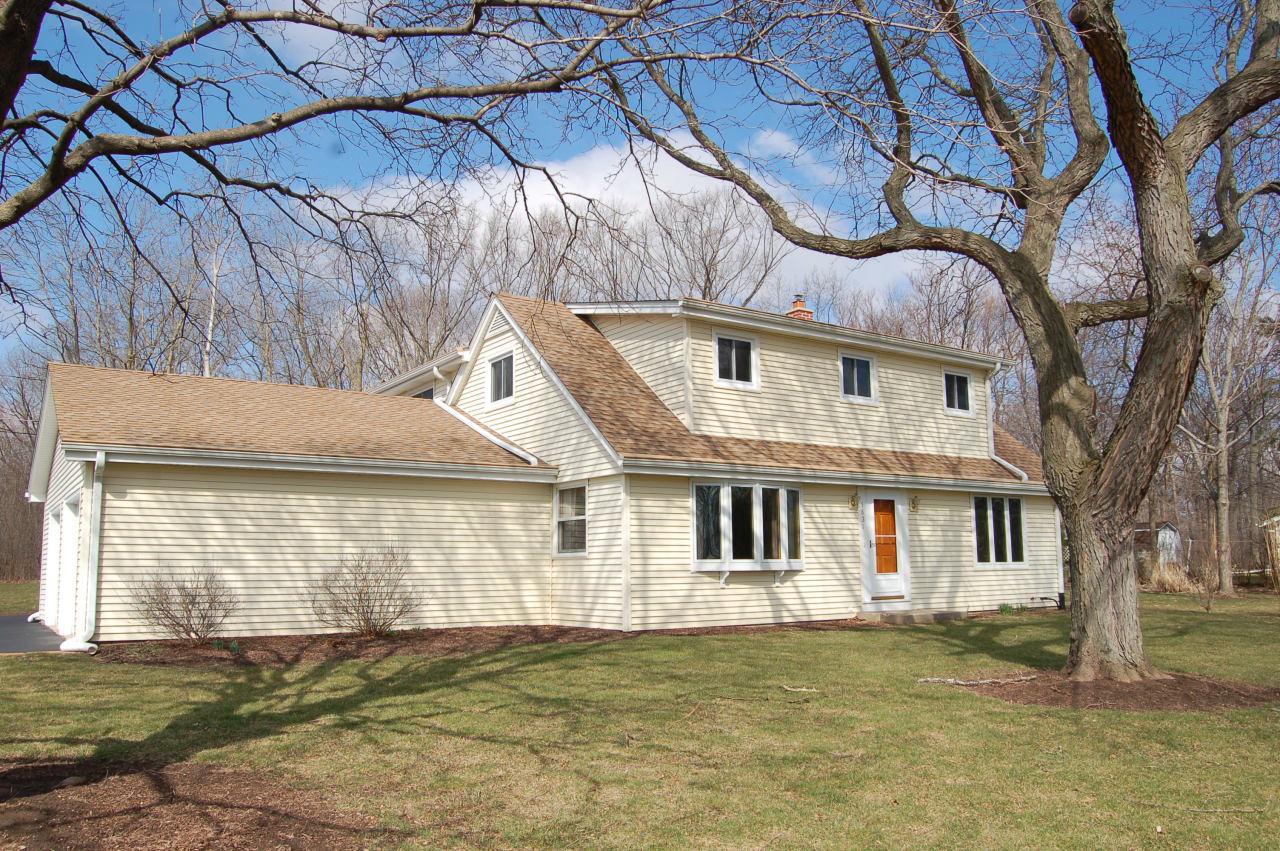 Long time owner offers 5br 3ba cape cod on big private lot in new